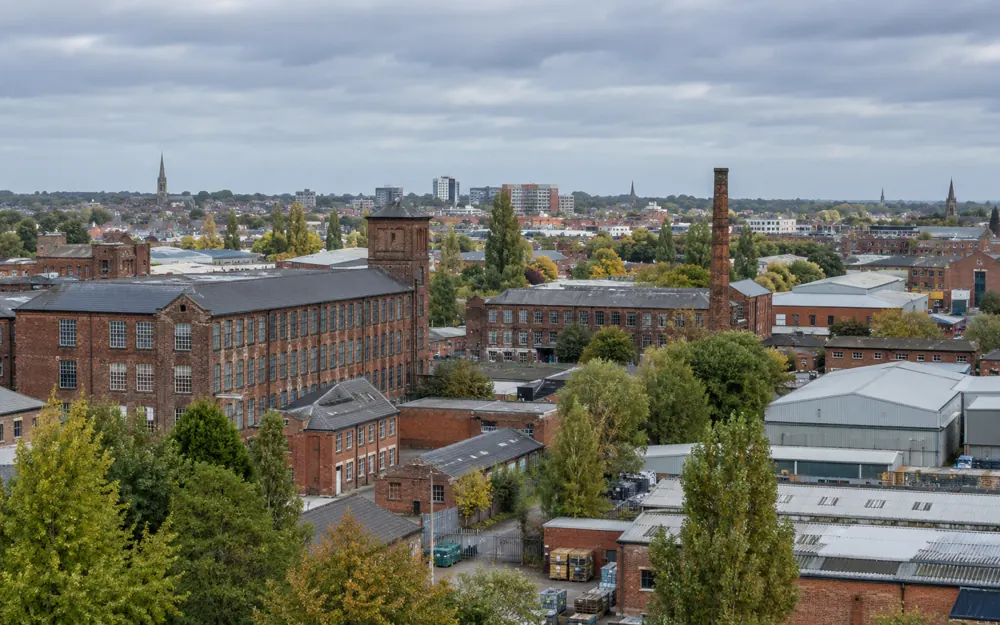 Midlands commercial buildings and former brick mills with trees